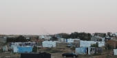 تحولت منطقة مرج الخوخ إلى أحياء سكنية لمئات العمال الزراعيين الوافدين ولبعض العمال الذين يعملون في قرى المنطقة