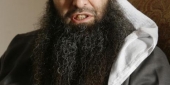 مواطنون في أحد الملاجئ في بابا عمرو (رويترز)