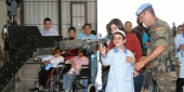  32  طفلاً من ذوي الإحتياجات الخاصة من مركز الرعايا الاجتماعية في سوق الخان يزورون  قاعدة "ميغيل دي سيربانتس" العسكرية